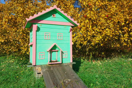 Honey bee hives in autumnal apple garden