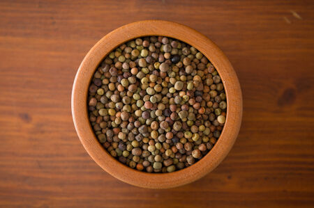 Legume Roveja seeds in a wooden jarの写真素材