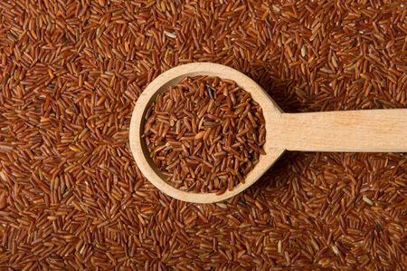 Jasmine Brown Rice on a Wooden Spoonの写真素材