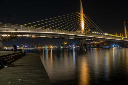 HaliÃ§ Metro Bridge with wooden docks in the frame. A quiet night our in Ä°stanbul by the Marmara Sea.の写真素材