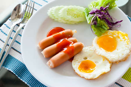 English breakfast - fried eggs, sausagesの写真素材