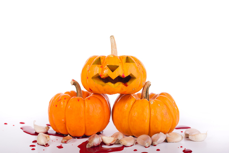 halloween pumpkin red blood on white backgroudの写真素材