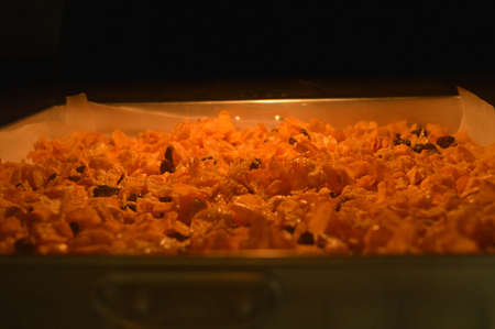 cereal made from cornflakes and caramel in ovenの写真素材