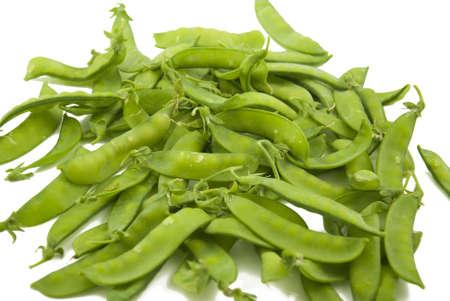 Fresh snow peas on white