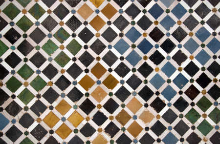 Colorful detail of a wall in Alhambra Castle, Granada Spain.
