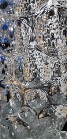 Reflection on convex polygon surface glass.Riffled glass texture. Background.の写真素材