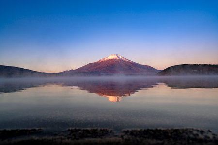 Reflection of Mount Fuji on the lakeの写真素材