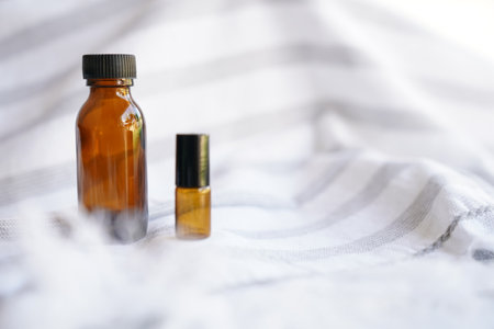Various sized of amber glass bottle on white backgroundの写真素材