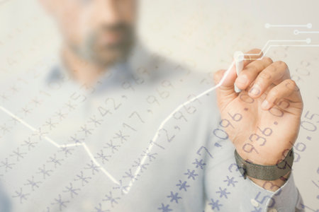 Man giving a business presentation using a futuristic digital penの写真素材