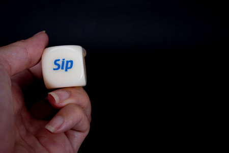 Drinking dice game isolated on black backgroundの写真素材