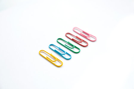 Colorful paper clips isolated on white background, clipping path included.の写真素材