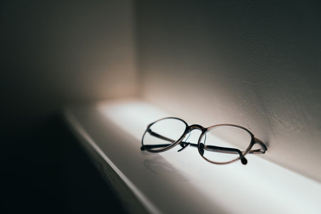 Glasses on the white windowsill in the morning. Selective focus.