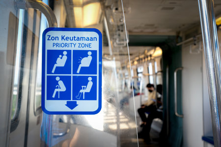 Priority seating zone for elderly and pregnant people in a public transport.の写真素材