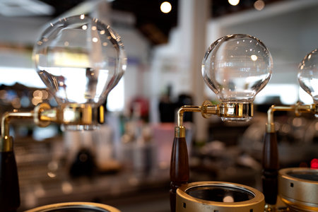 Coffee brewing equipment in coffee shop. Blurred background.