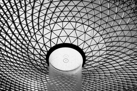 Ceiling of a modern building. Black and white photo.