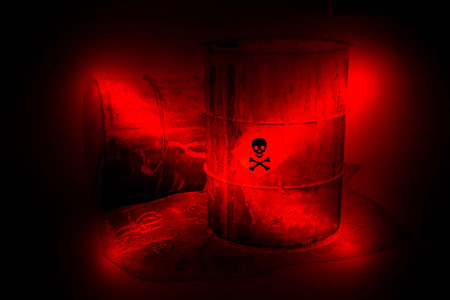 Silhouette of a skull and crossbones on a red background. Selective focus. Halloween concept.の写真素材