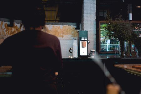 Barista making coffee in coffee shop. Barista working in coffee shop.の写真素材