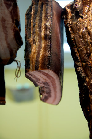 smoked meat in a butcher shop, close-up of meatの写真素材