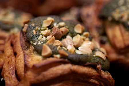 Close-up of a croissant with pistachios and almondsの写真素材