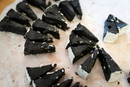 Japan, Hokkaido island, Furano, production of cheese with squid ink