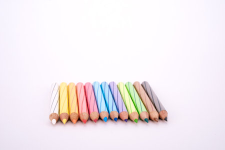 Multi colour pencils on white backgroundの写真素材