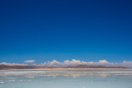 The impressive Salar de Uyuni (Uyuni Salt Falt) in southwest Bolivia. This the world's largest salt flat. It is covered by several meters of salt and lithium crust.の写真素材