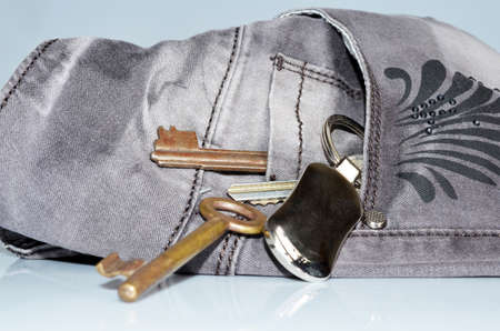 Retro FIltered Set Of Apartment Or Car Keys In Silver Jeans Pocketの写真素材
