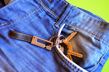 Retro FIltered Set Of Apartment Or Car Keys In Jeans Pocketの写真素材