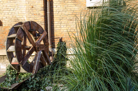 Wooden wheel of an old water millの写真素材