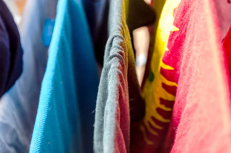 Pile of colorful laundry clothes close upの写真素材