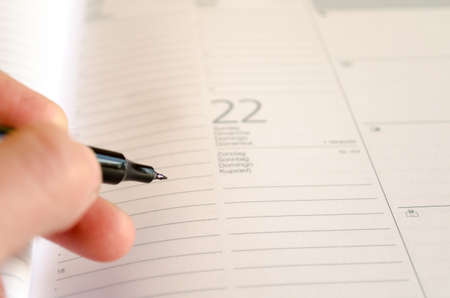 White notepad and ink penの写真素材