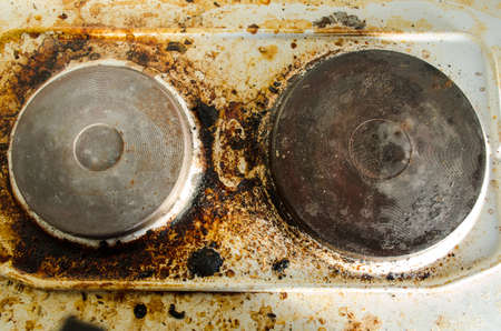 Rust stains on the old electric stoveの写真素材