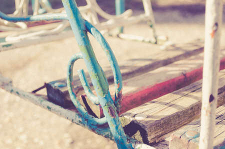 Old swing closeup view of wood (Processed with retro preset)の写真素材