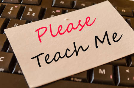 Please teach me Concept on black keyboardの写真素材