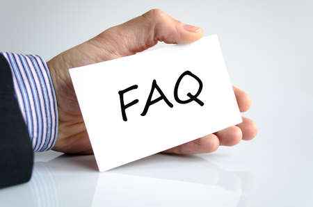 Faq note in business man handの写真素材