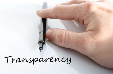Pen in the hand isolated over white background Transparency conceptの写真素材