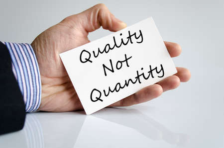 Quality not quantity text concept isolated over white backgroundの写真素材