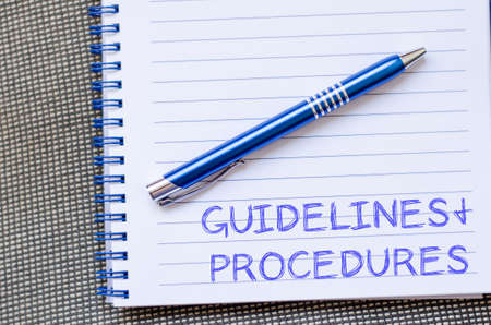 Guidelines and procedures text concept write on notebook with penの写真素材