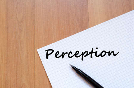 Perception text concept write on notebook with penの写真素材