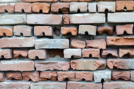 Detail of old and abandoned brick wall