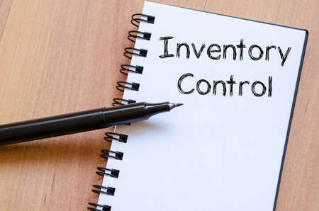 Inventory control text concept write on notebook with penの写真素材