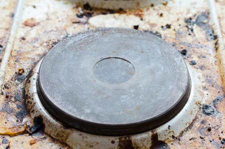 Very dirty hot plate in the kitchenの写真素材