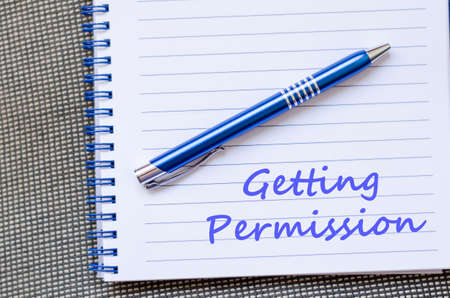 Getting permission text concept write on notebook with penの写真素材