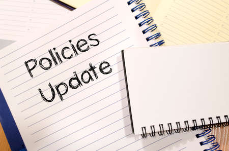 Policies update text concept write on notebookの写真素材