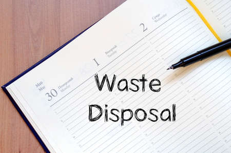 Waste disposal text concept write on notebookの写真素材