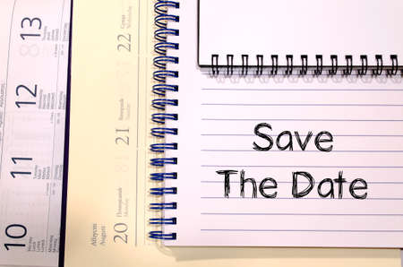 Save the date text concept write on notebookの写真素材