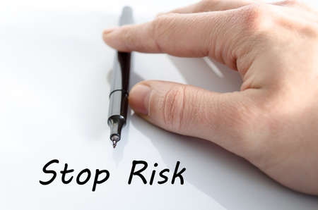 Stop risk text concept isolated over white backgroundの写真素材