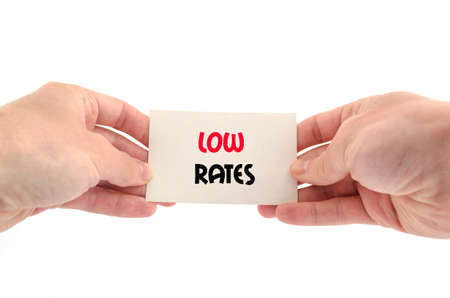 Low rates text concept isolated over white backgroundの写真素材