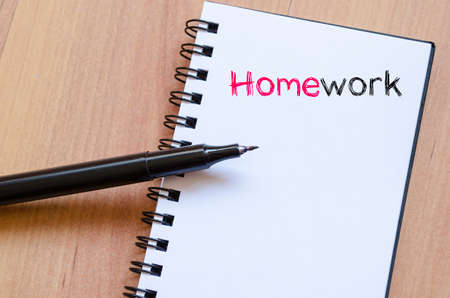 Homework text concept write on notebookの写真素材