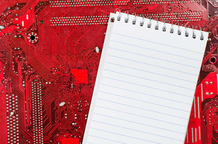 Red old dirty computer circuit boardの写真素材